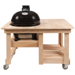 Primo Oval Junior 200 Ceramic Kamado Grill On Countertop Cypress Table With Stainless Steel Grates - PGCJRH